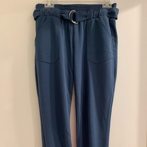 Blue buckled trousers